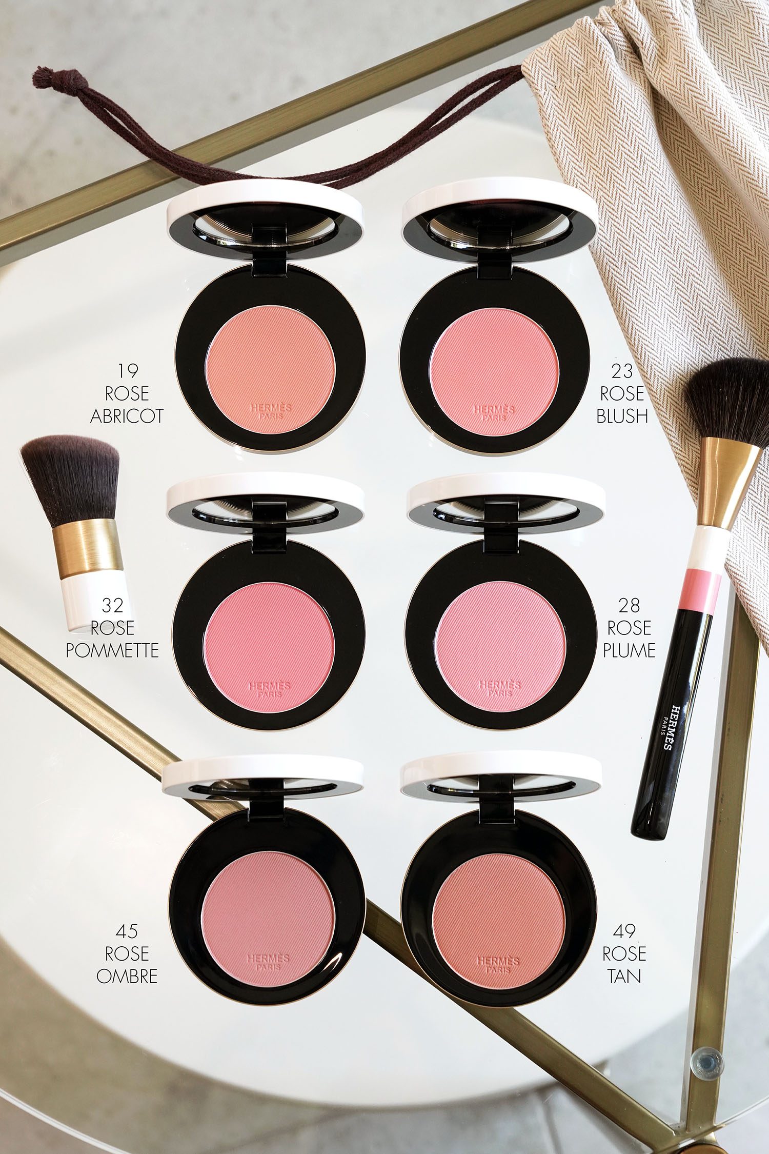 Rose Hermes Silky Blush Powder swatches via The Beauty Lookbook